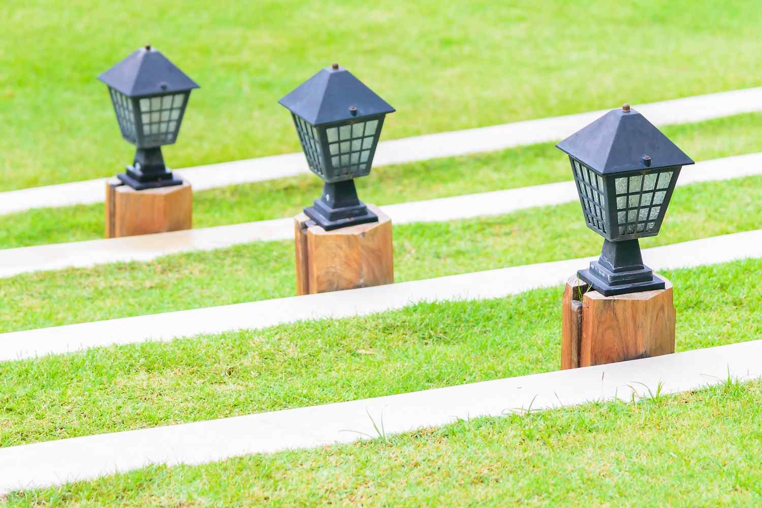 Low-profile LED fixtures along walkways provide safety without visual clutter.
